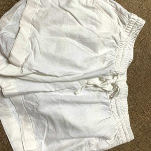 Cute linen shorts with a cuffed hem and drawstring waist. Size large